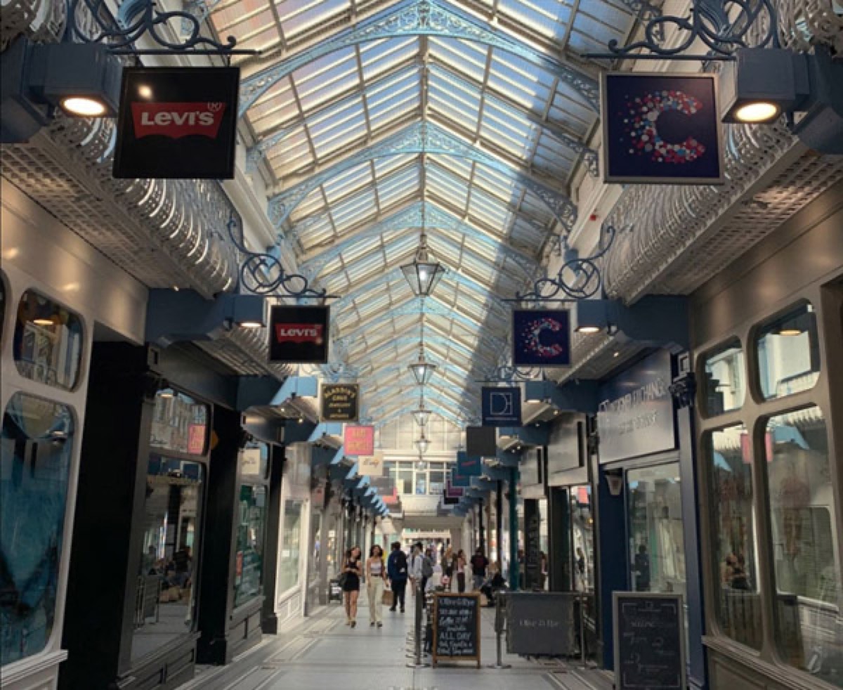 Queens Arcade, the Grade II Listed Victorian arcade in Leeds where Olive & Thai sits.